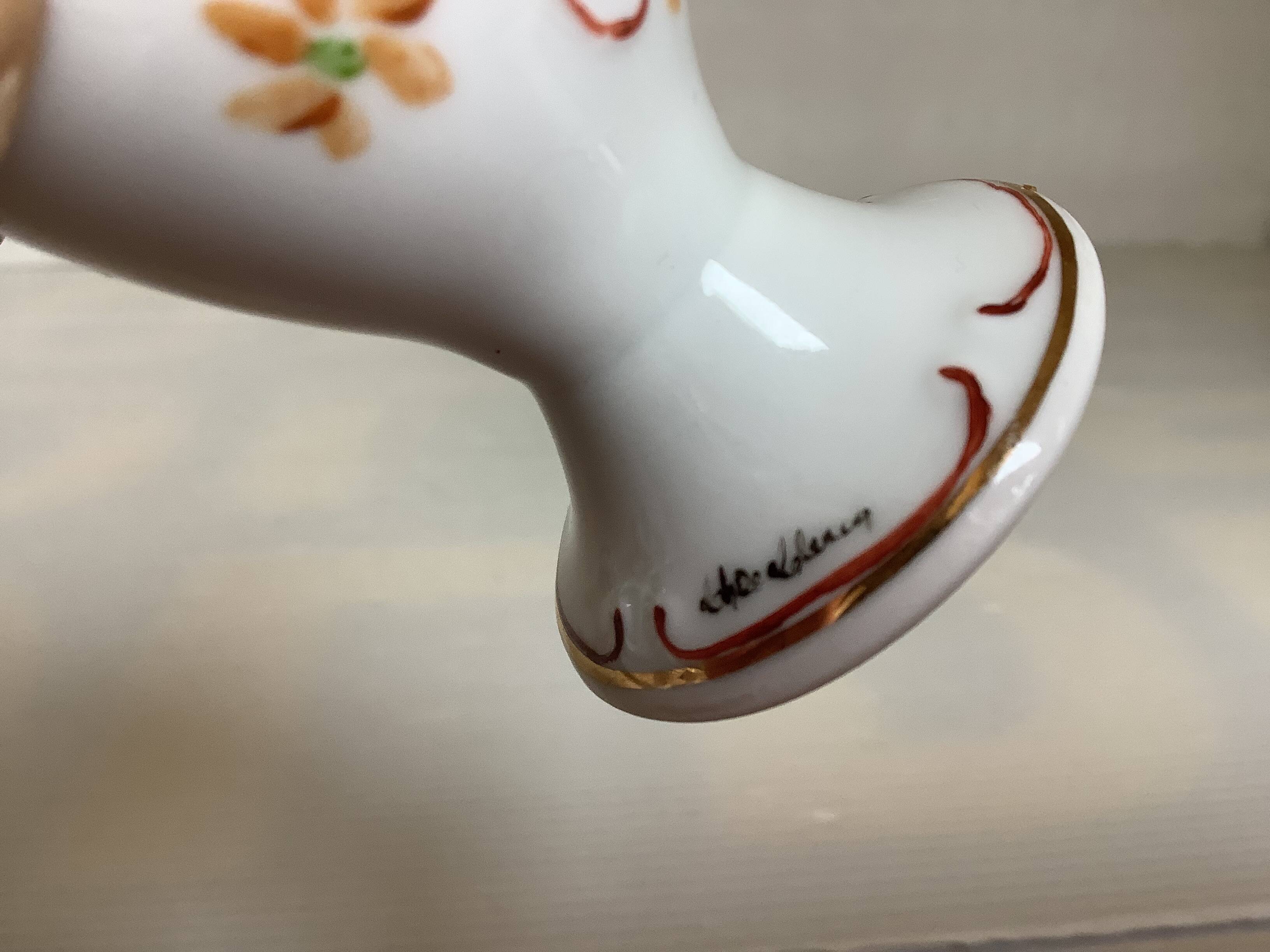 Six hand-decorated and signed egg cups