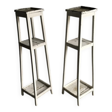 Two white vintage mid-20th century wooden plant stands, 3-tier shelves.