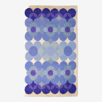 Tapis Desso fleur bleue