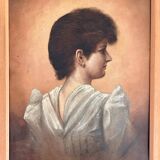 Jeune femme du XIXe siècle, capturée dans l'élégance tranquille.