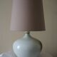 Glazed ceramic ball lamp signed Bossis with a fabric shade.