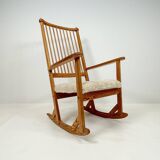 Mid-century rocking chair in pine and sheepskin by Yngve Ekström, Sweden.