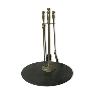 Gilded brass fireplace servant.