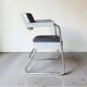 2 armchairs from the 1950s in the Ronéo style of Pullman.