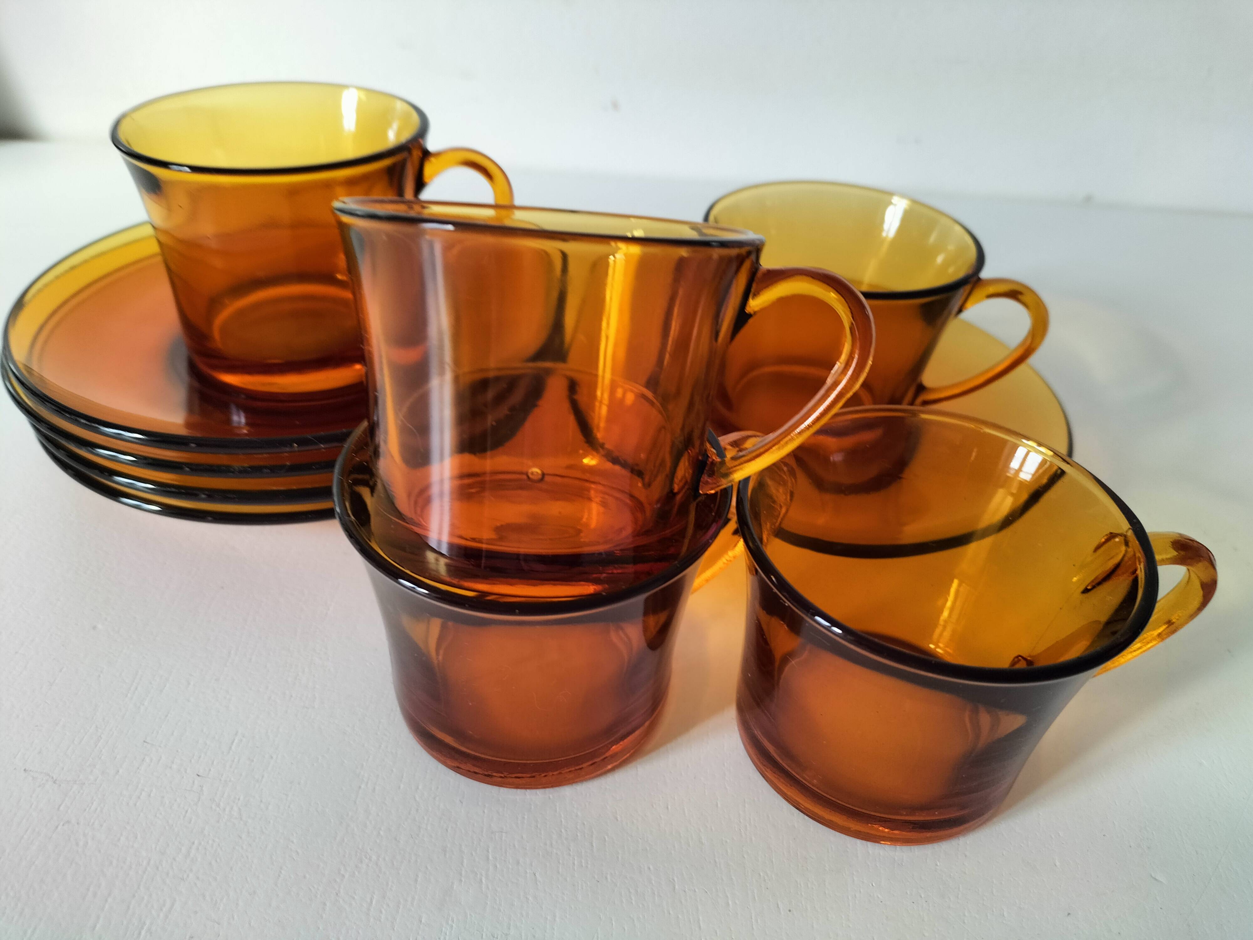 5 vintage amber Duralex cups and saucers