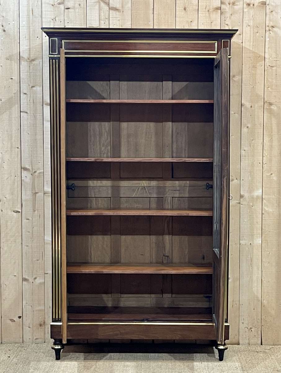 Napoleon III library in mahogany and brass nets (XIXth)