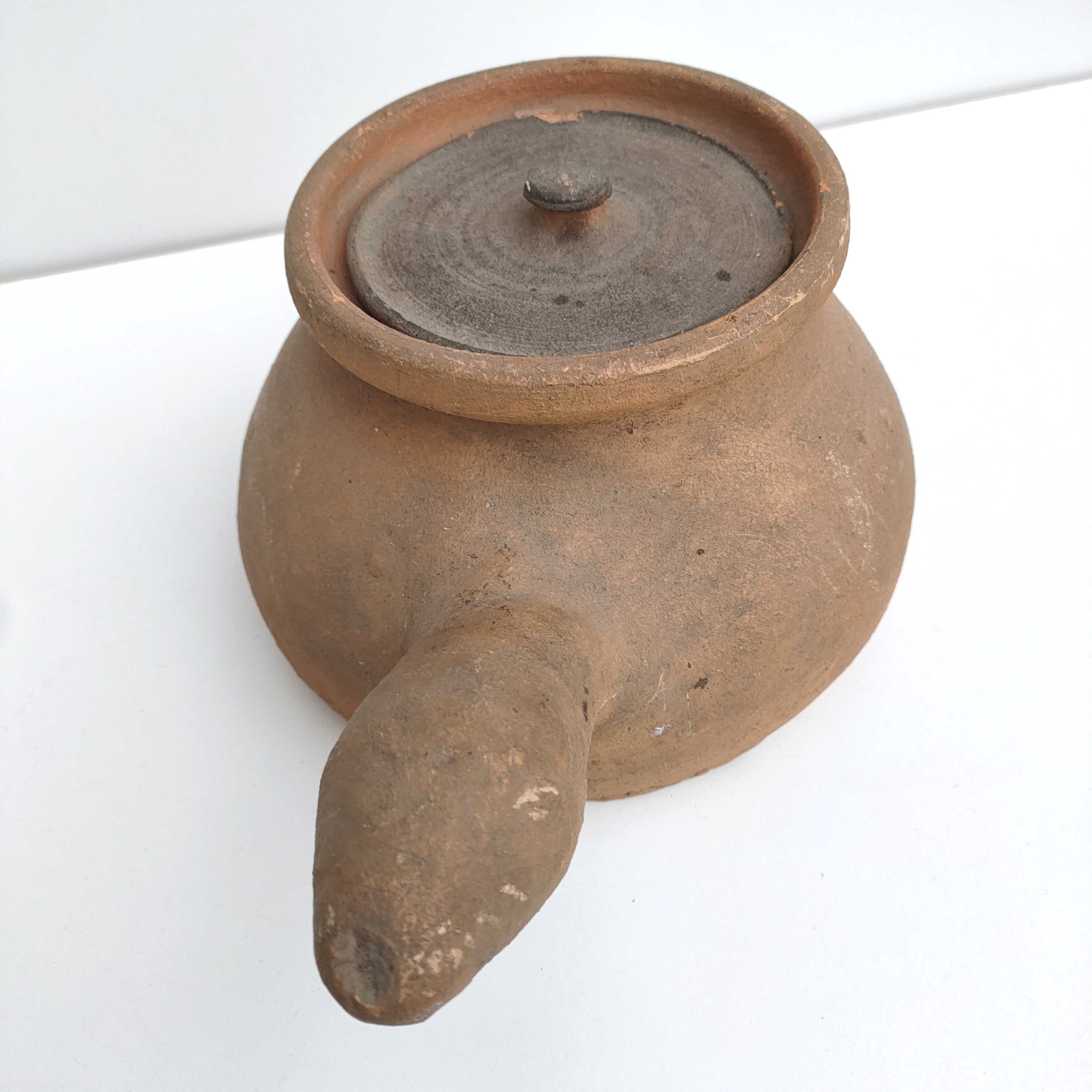 Ancient terracotta "devil" casserole