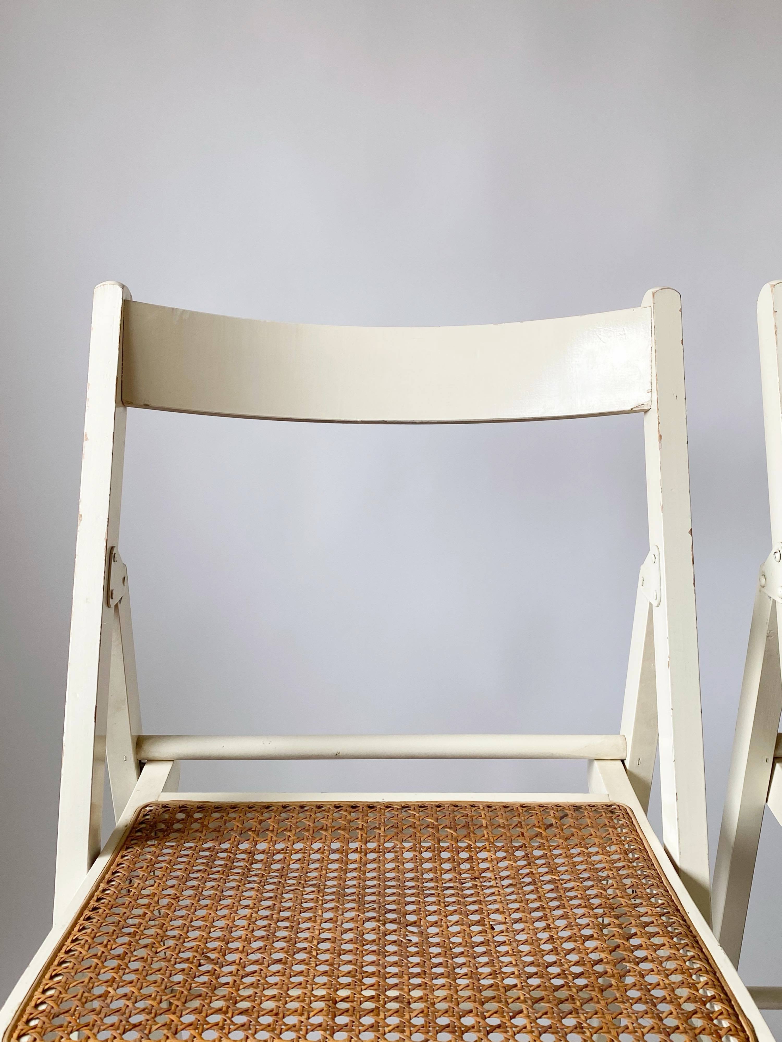 Pair folding chairs caning