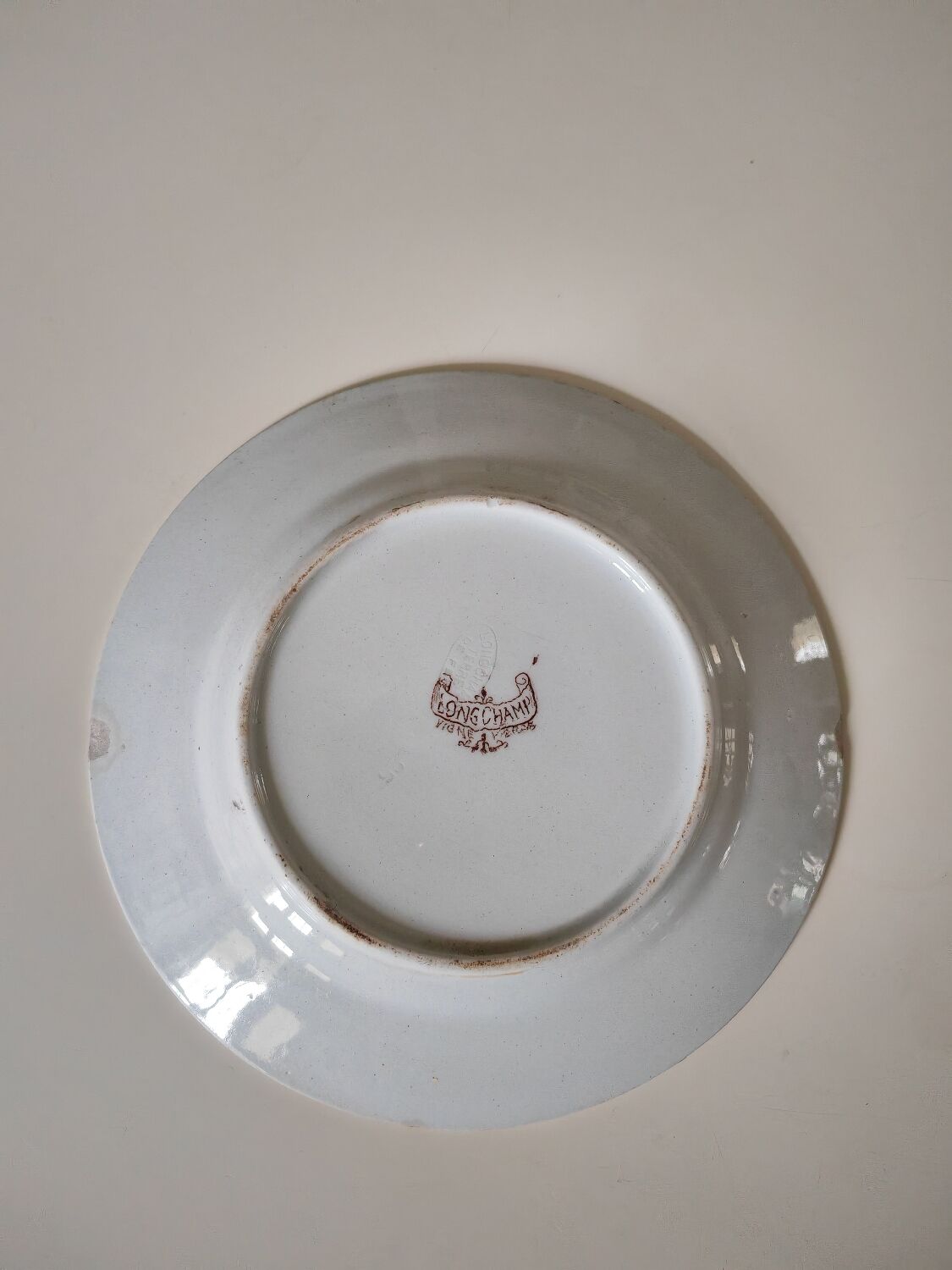 Lonchamp iron earth plate