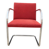 Vintage cantilever chair in chrome and burgundy fabric.