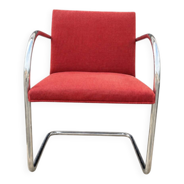 Vintage cantilever chair in chrome and burgundy fabric.