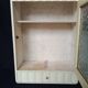 Old wall cabinet with one door and one drawer