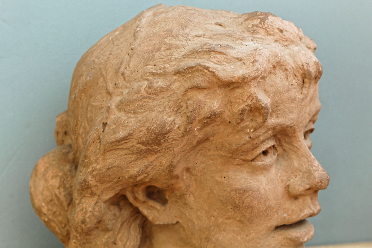 Woman's head, reconstituted stone