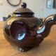 Brown ceramic teapot