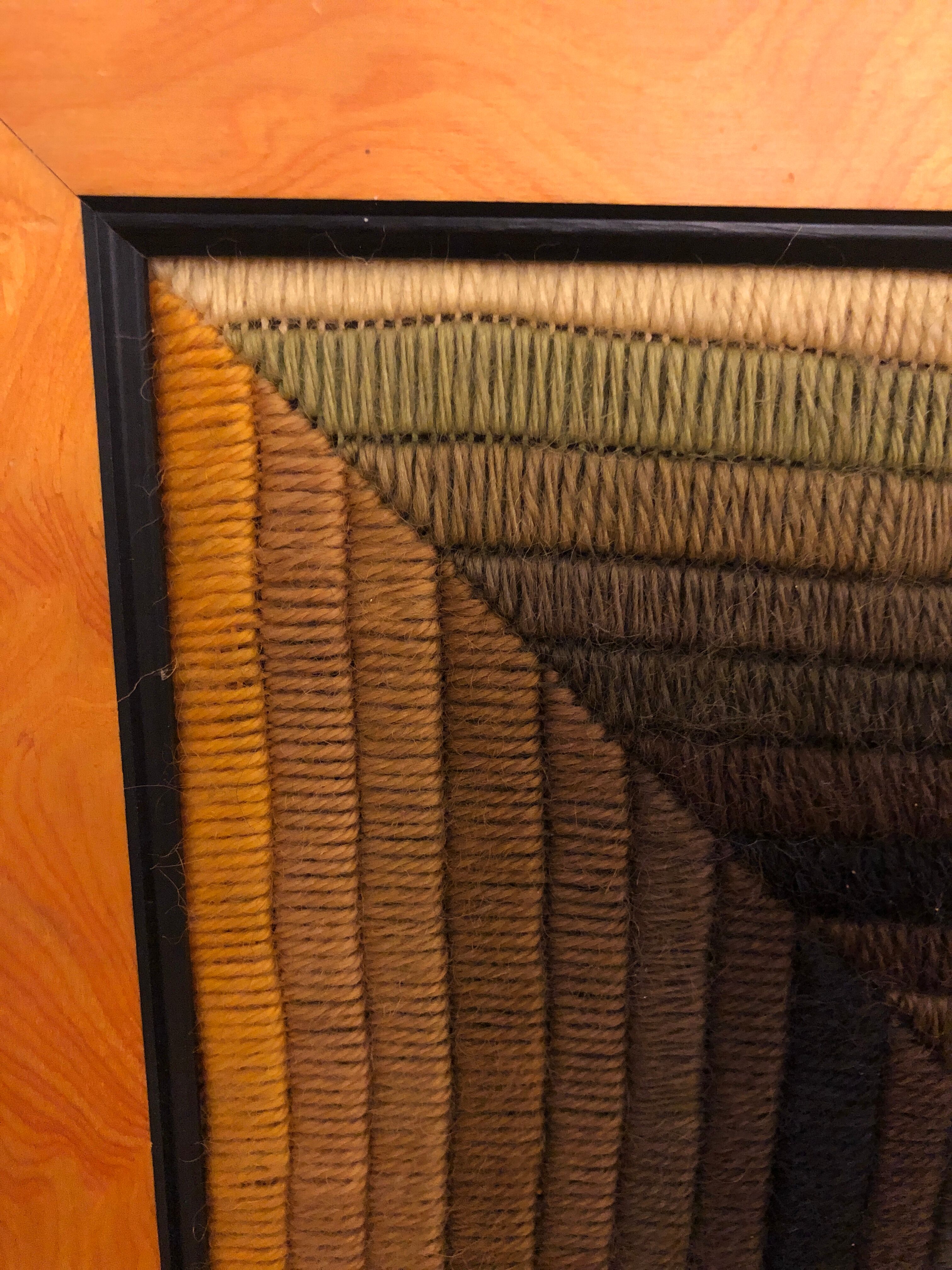 Kinetic tapestry with geometric pattern by Patrice Allard.