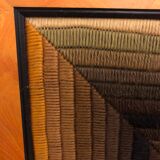 Kinetic tapestry with geometric pattern by Patrice Allard.