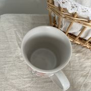 Vintage white porcelain mug or mug retro floral pattern