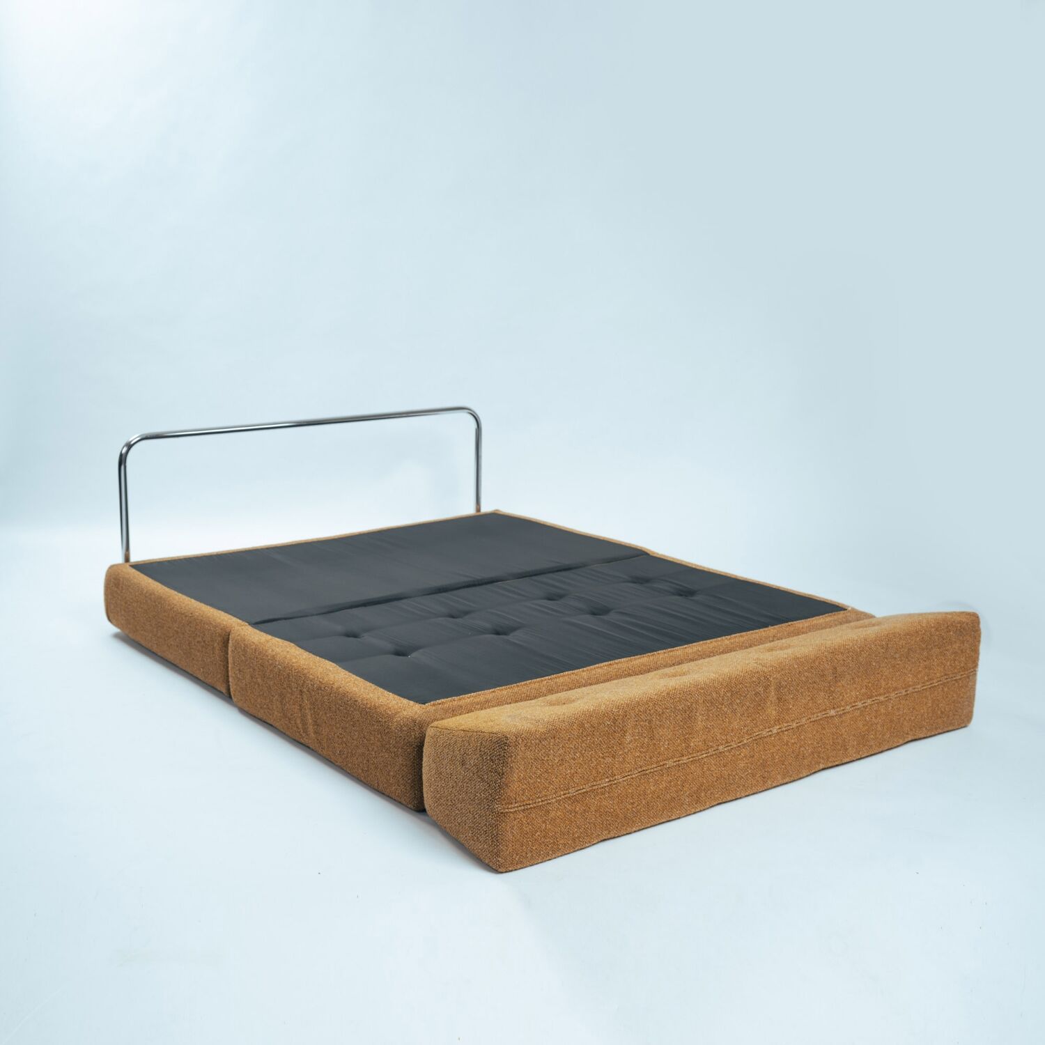 Bauhaus style tubular sleeping sofa in yellow ocre wool