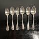 Small silver-plated metal spoons
