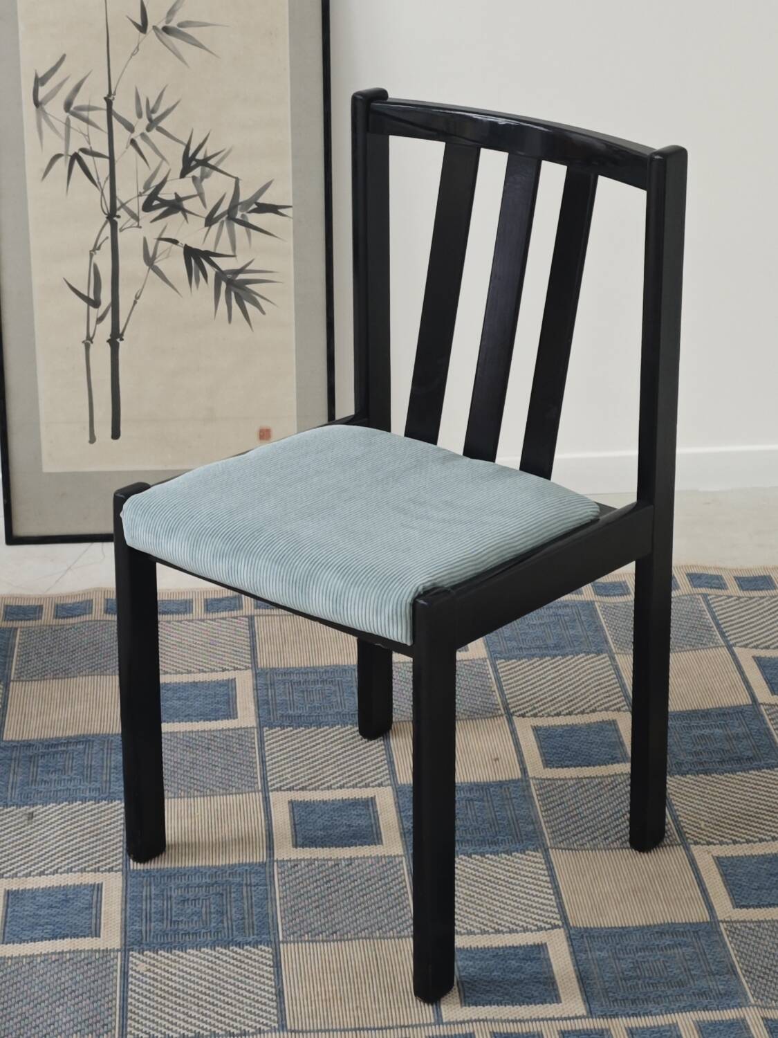 Set of 4 modernist black chairs with light blue ribbed fabric