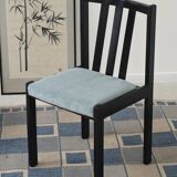 Set of 4 modernist black chairs with light blue ribbed fabric