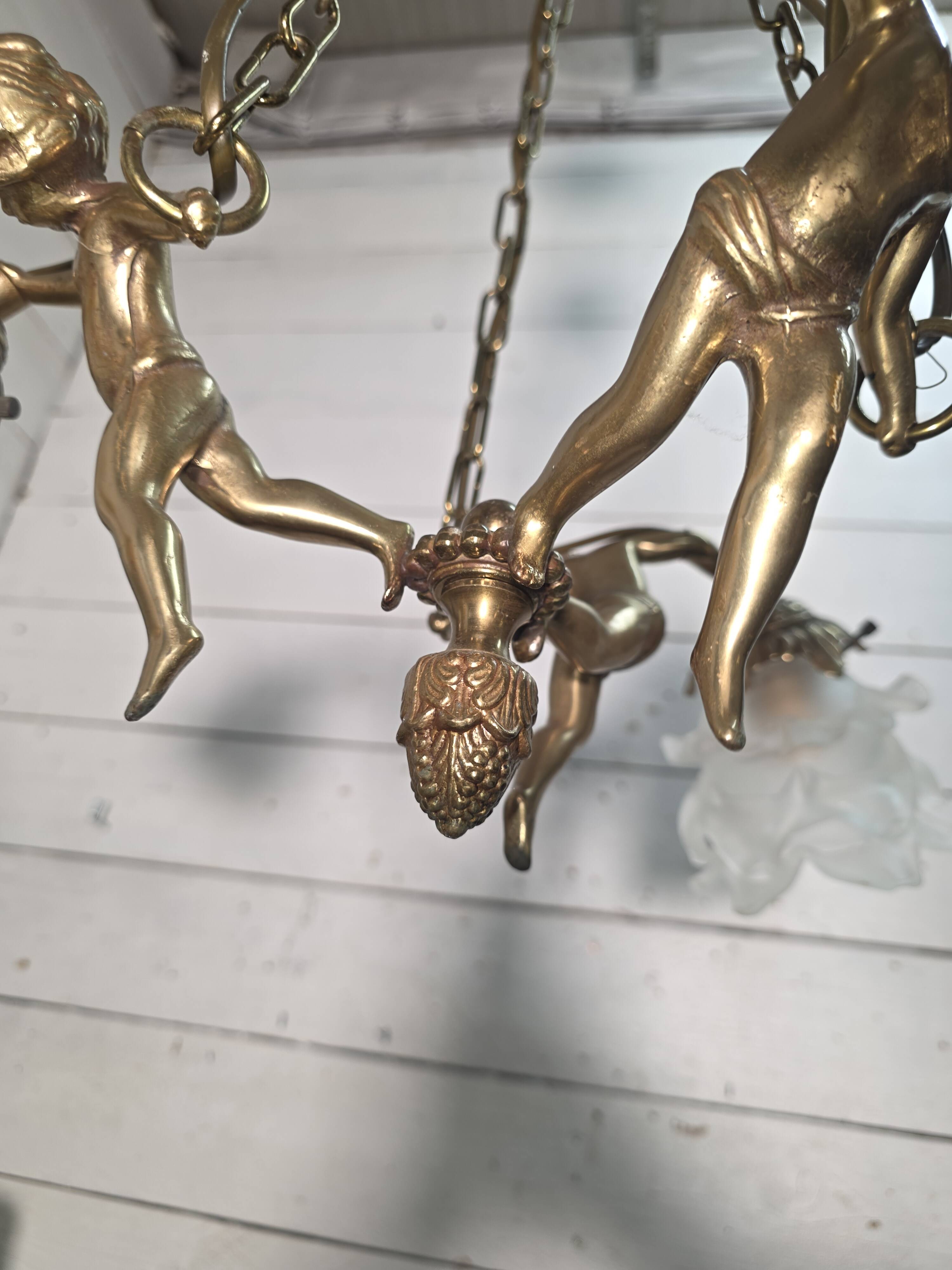Bronze cherub chandelier from the 1970s.
