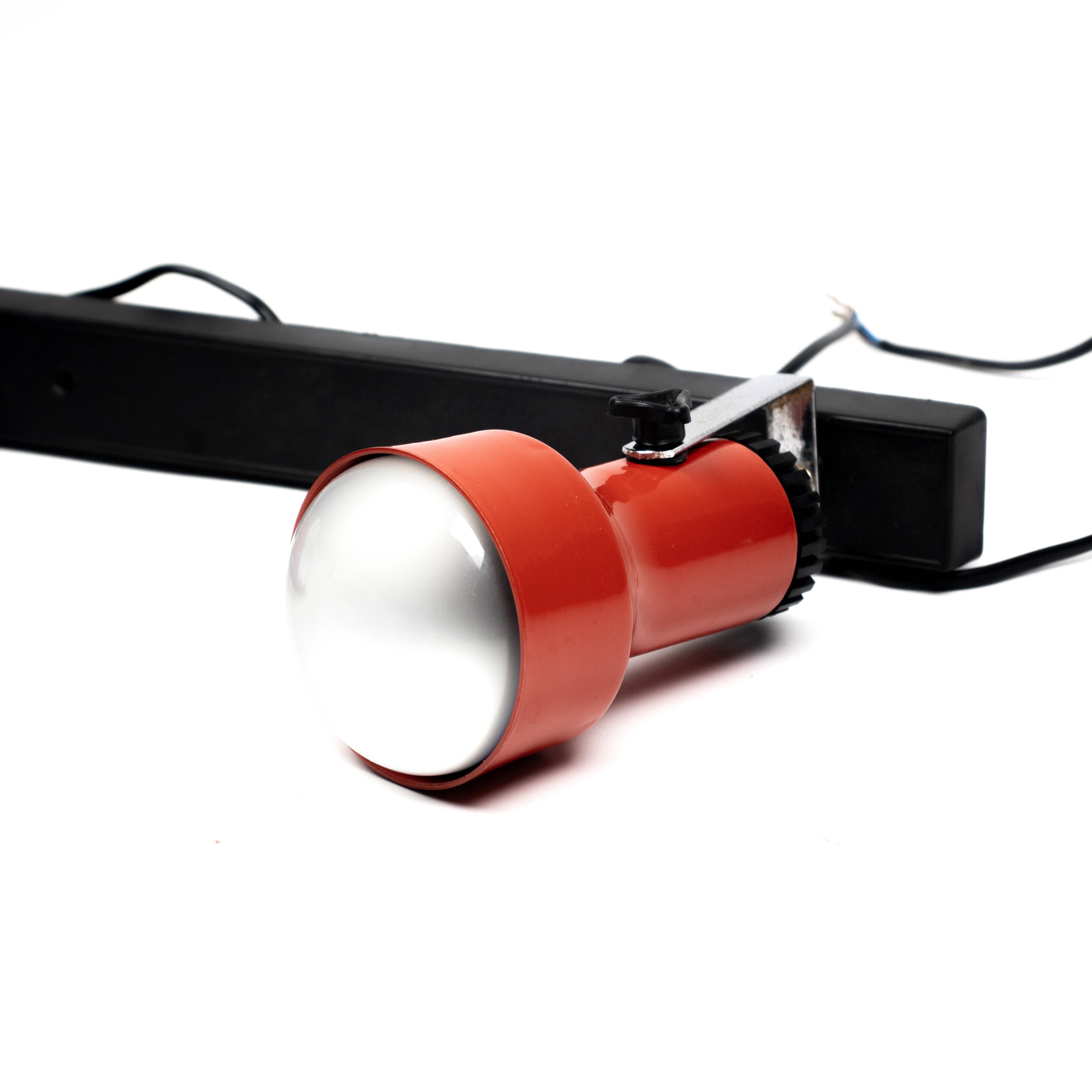Vintage red two-light spot lamp from the 70s.