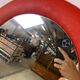 Miroir orange ovale vintage seventies 46 X 80 cm