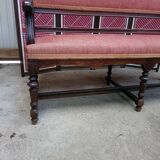 Ancienne banquette style Louis XVI en bois massif avec assise et dossier tissés