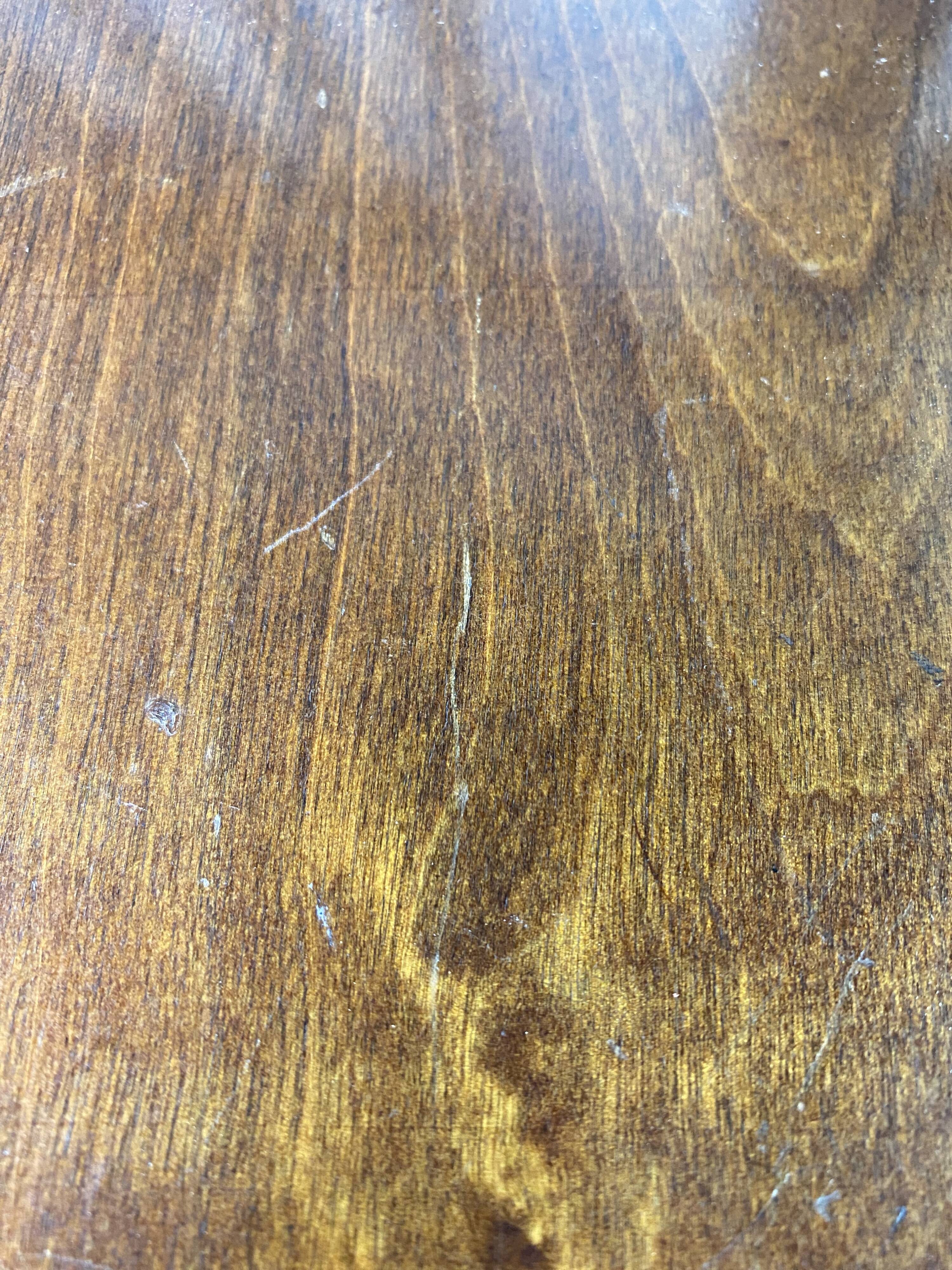 Baumann rotating wooden armchair