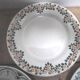 six plates mismatched earthenware