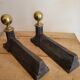 Pair of cast iron and brass chenets