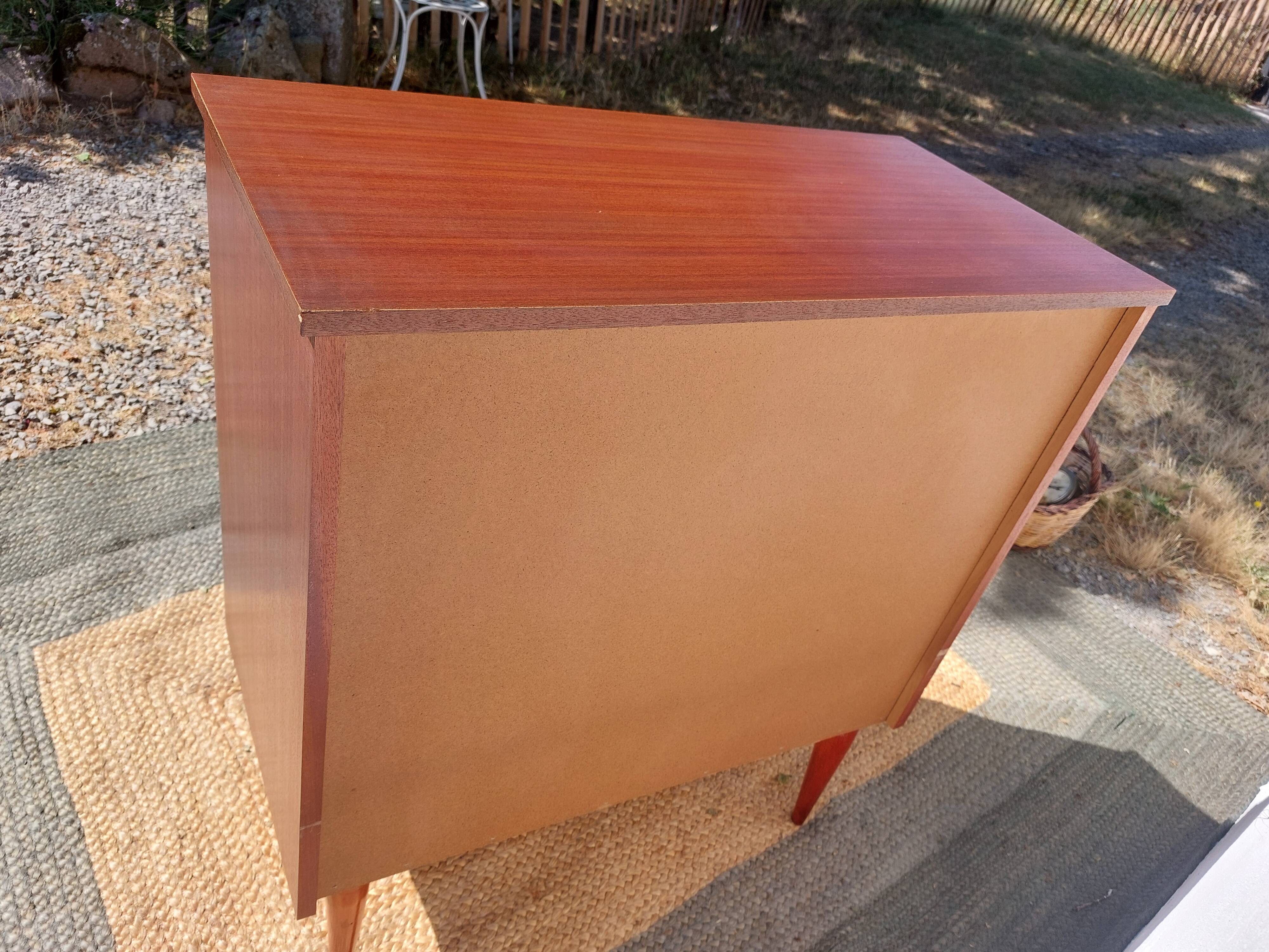 1960s chest of drawers, spindle legs, recessed handles