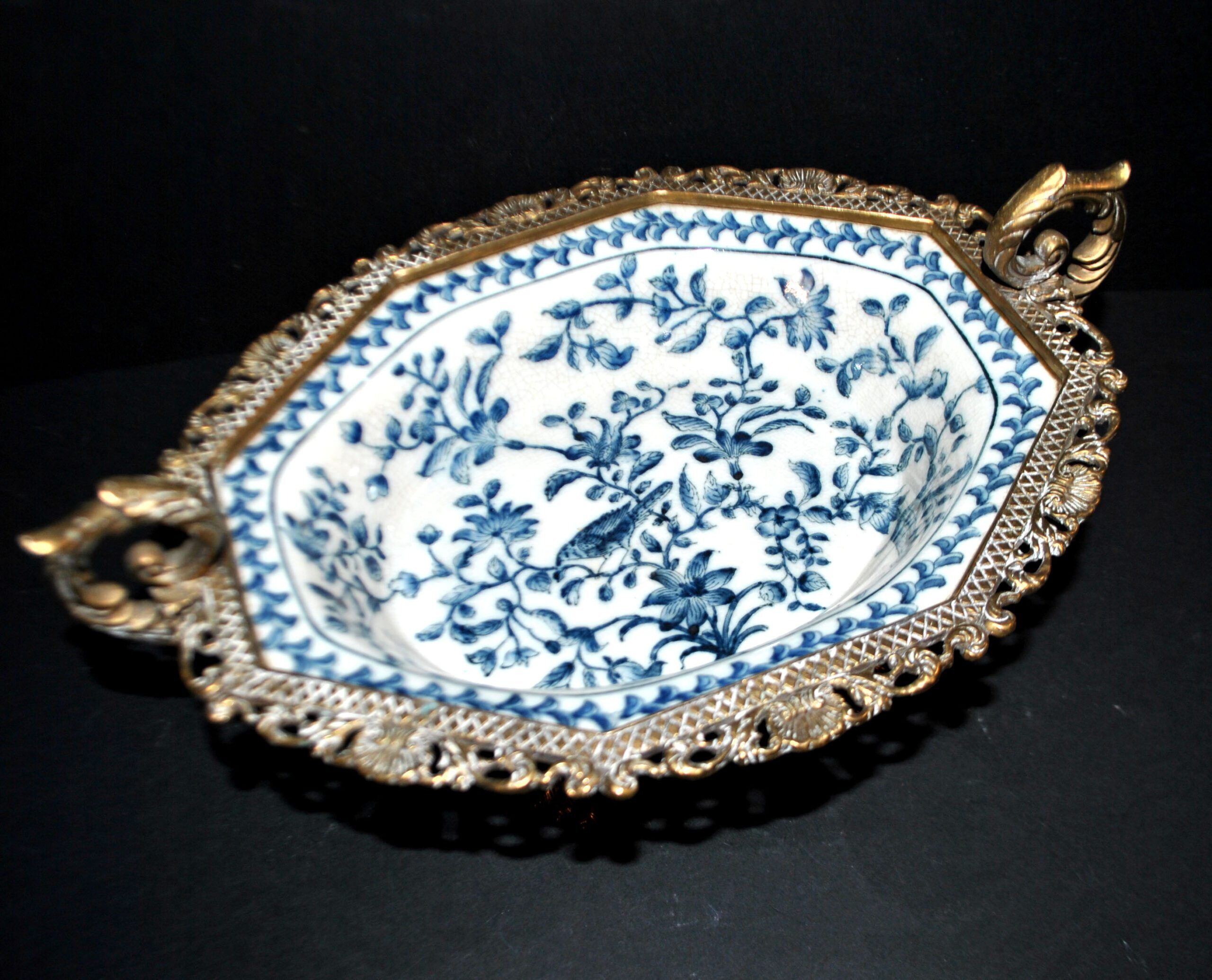 Blue Chinese floral porcelain coupe on a bronze base table centrepiece.