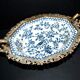 Blue Chinese floral porcelain coupe on a bronze base table centrepiece.