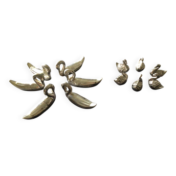 Set of 6 knife rests and six swan place card holders.
