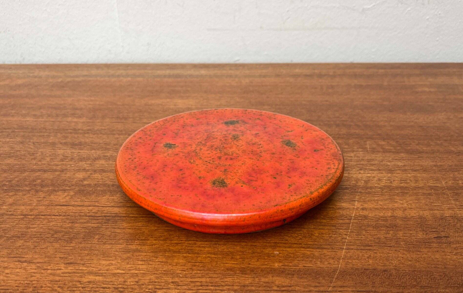 Mid-century modern Danish studio pottery, orange wall coat rack by Signe Boesen Northroup, 1960s.