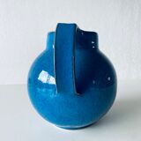 Old pitcher in glazed stoneware