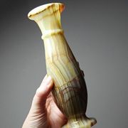 A pair of vintage baluster vases in green striped onyx from Italy, mid-century.