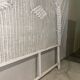 White rattan bedroom set: chest of drawers, mirror, bed, basket