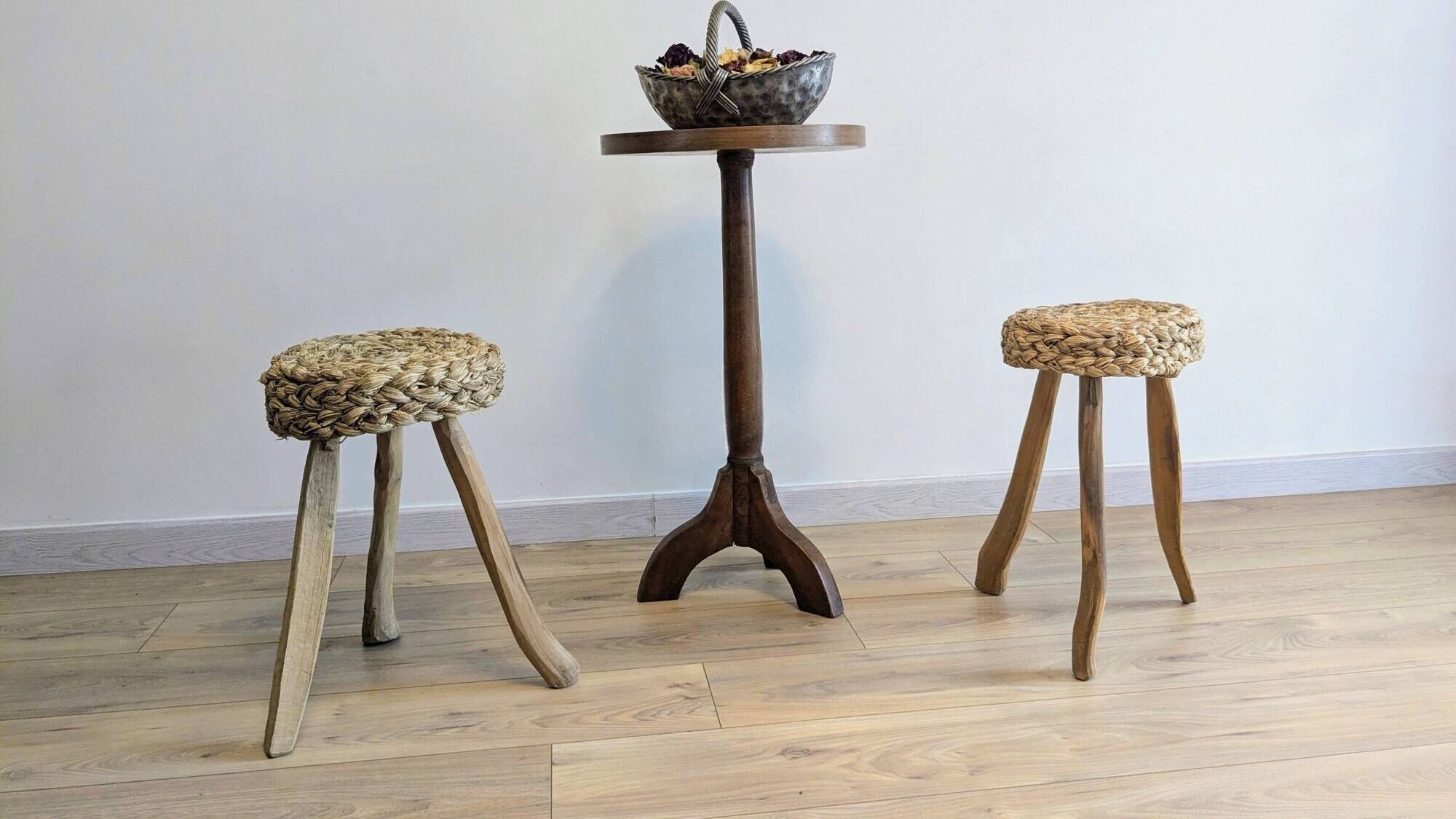 Pair of brutalist tripod stools attributed to Audoux & Minet.