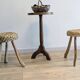 Pair of brutalist tripod stools attributed to Audoux & Minet.