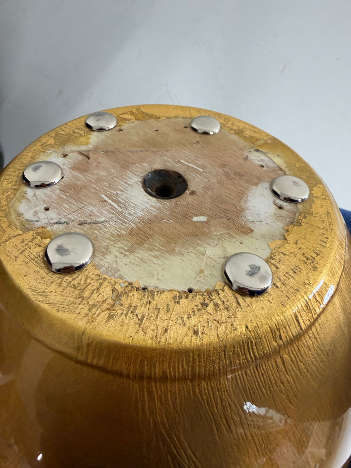 Vintage Italian design coffee table with a glass top and gold base, dating from the 1980s.