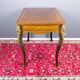 French Louis XV style table with bronze mounts