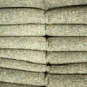 Fauteuil et pouf Togo en tweed émeraude