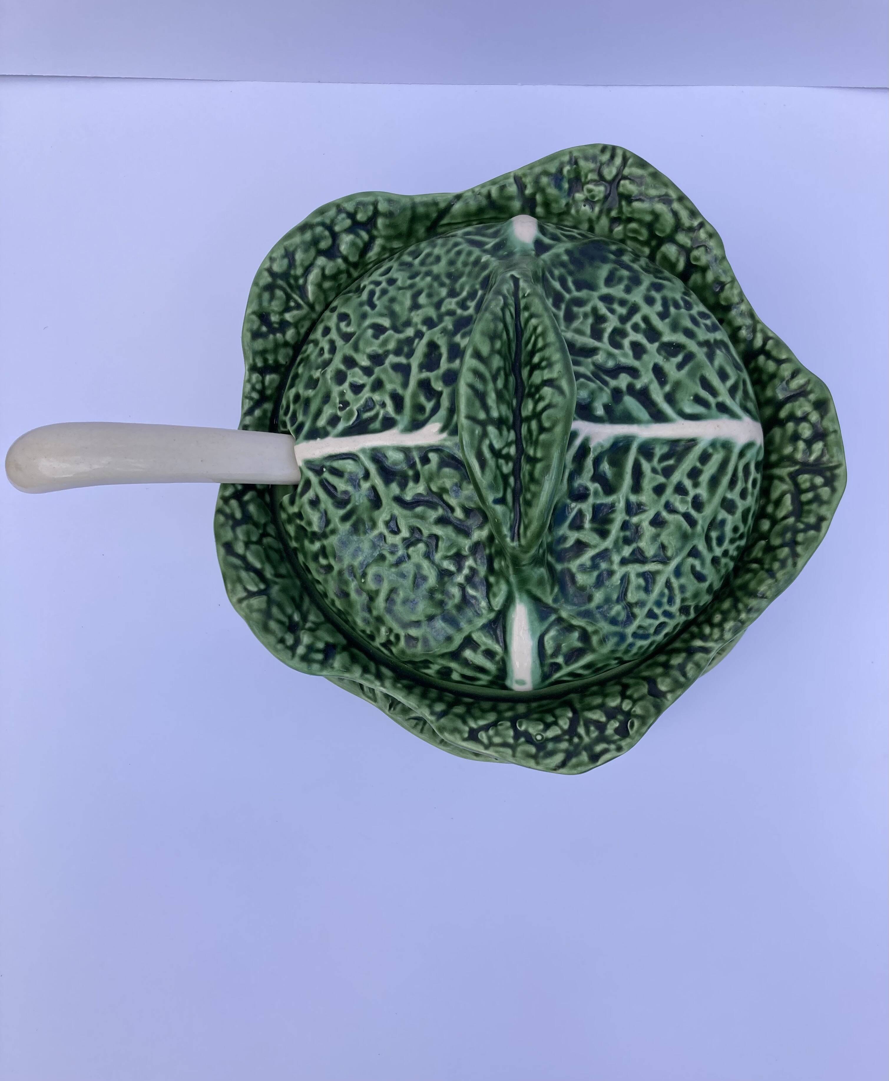 Vintage ceramic soup tureen in the shape of a cabbage.