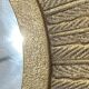 Golden metal sun mirror