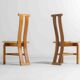 Sculptural postmodern dining chairs in wood with curved back, 1980s