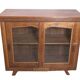 Antique glass-fronted buffet in Burmese teak