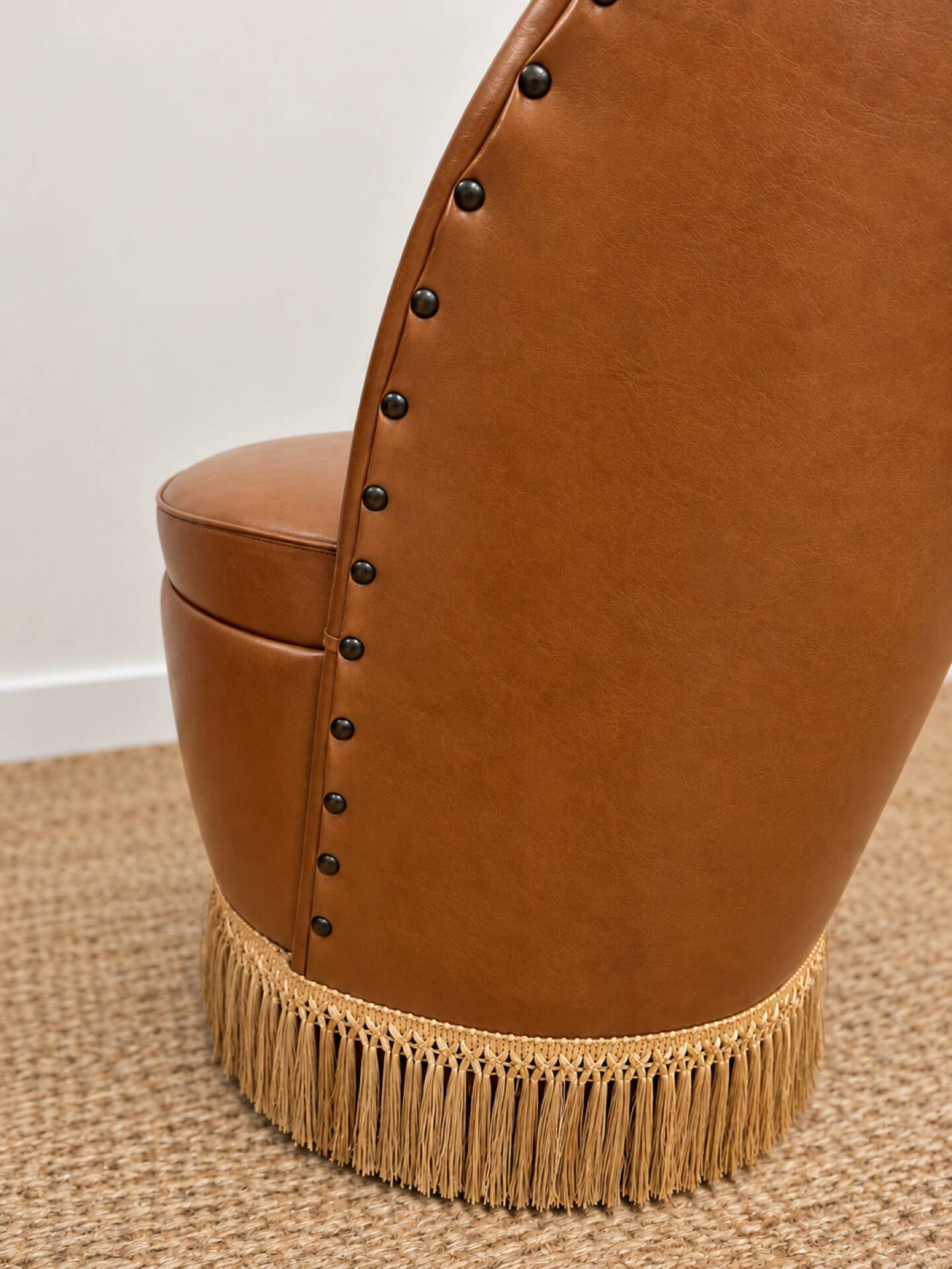 Vintage cognac fringe tub chairs